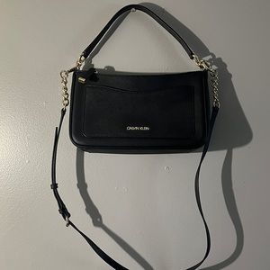 Black Leather Calvin Klein shoulder bag that converts to crossbody.